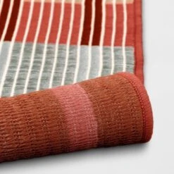 7'x10' Dashed Stripe Outdoor Rug Warm - Threshold™ -Threshold Outdoor Deals Store GUEST b8fbbf76 f033 4c66 93bc f2e802cd60dd