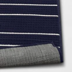 7'x10' Thin Stripe Rectangular Woven Outdoor Area Rug Navy/Ivory - Threshold™ 5 7'x10' Thin Stripe Rectangular Woven Outdoor Area Rug Navy/Ivory - Threshold™ -Threshold Outdoor Deals Store GUEST d8dd5e92 4349 401f 907f d39c6645ef8e