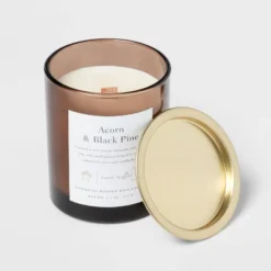 Clear Colored Glass With Woodwick And Brass Metal Inset Lid Acorn + Black Pine Candle Brown - Threshold™ 5 Clear Colored Glass With Woodwick And Brass Metal Inset Lid Acorn + Black Pine Candle Brown - Threshold™ -Threshold Outdoor Deals Store GUEST e82cdb94 c293 4984 b5b6 1ca170680739